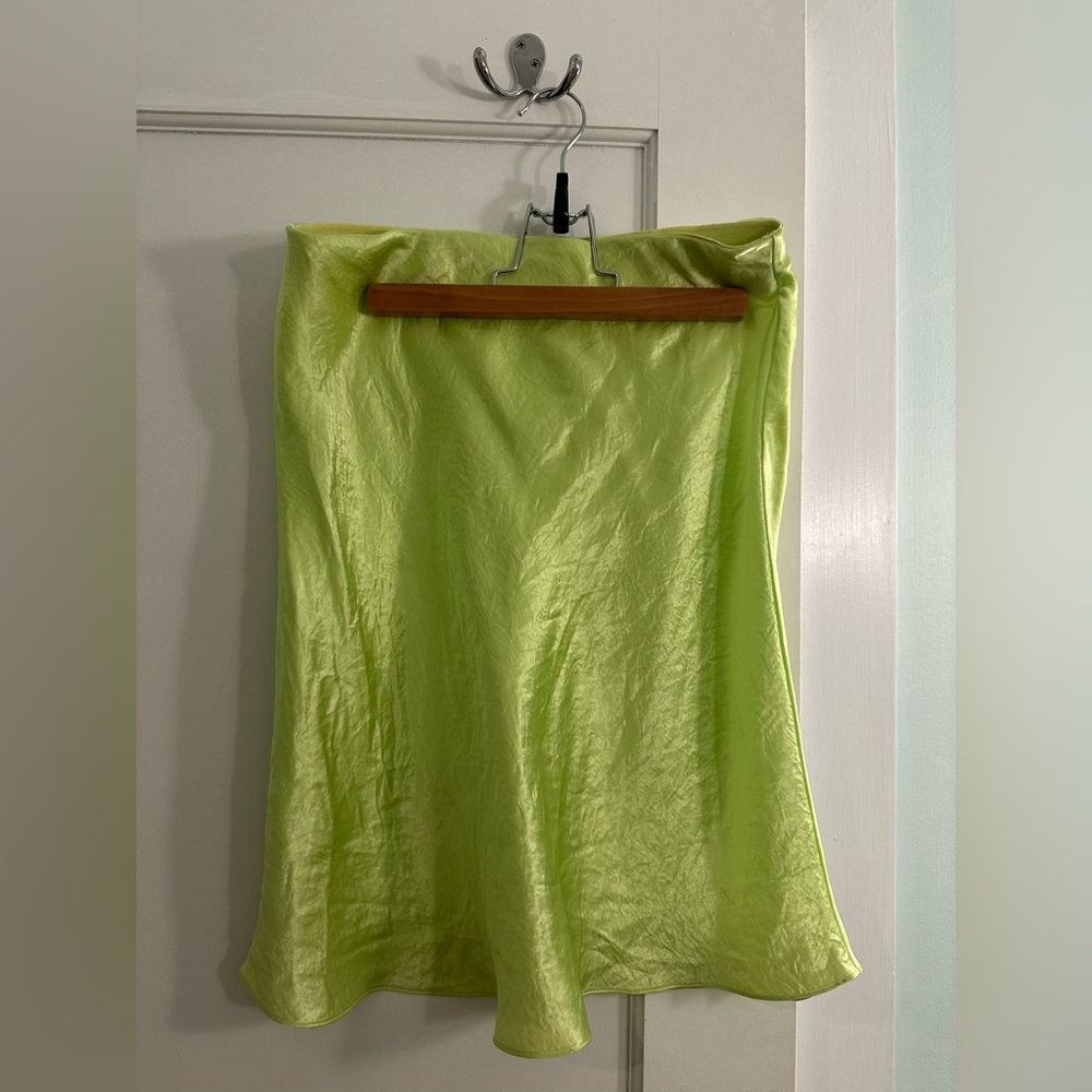 Babaton neon green mini skirt (from Aritzia)